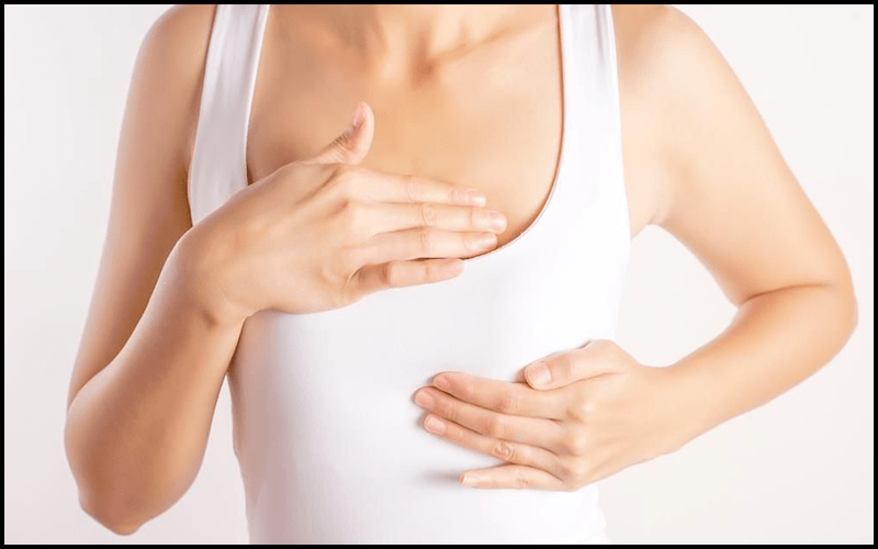 Núm vú bị đau và sưng là dấu hiệu rụng trứng rõ nhất